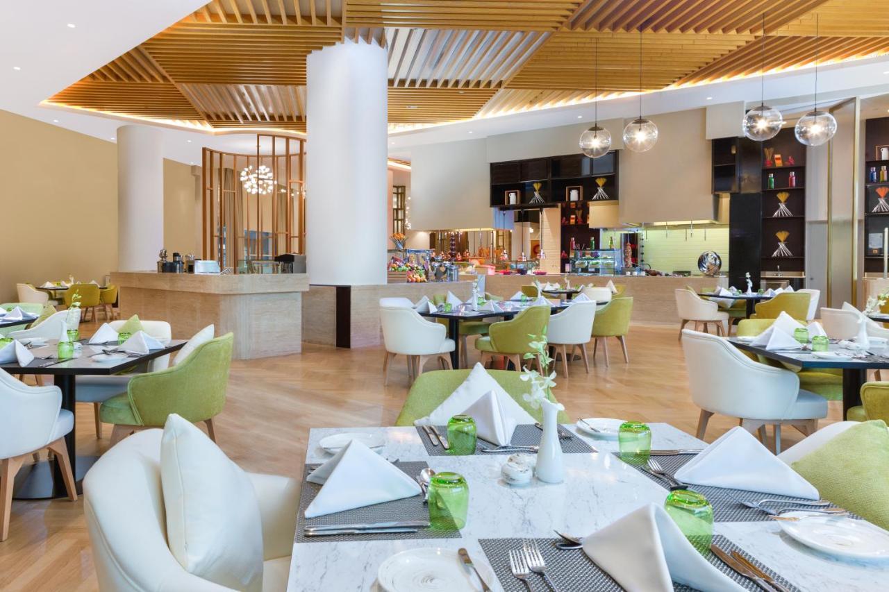 Hotel Dusitd2 Salwa Doha Exterior foto The restaurant