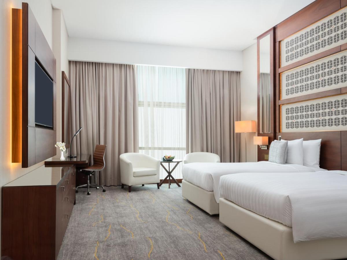 Hotel Dusitd2 Salwa Doha Exterior foto Deluxe Room
