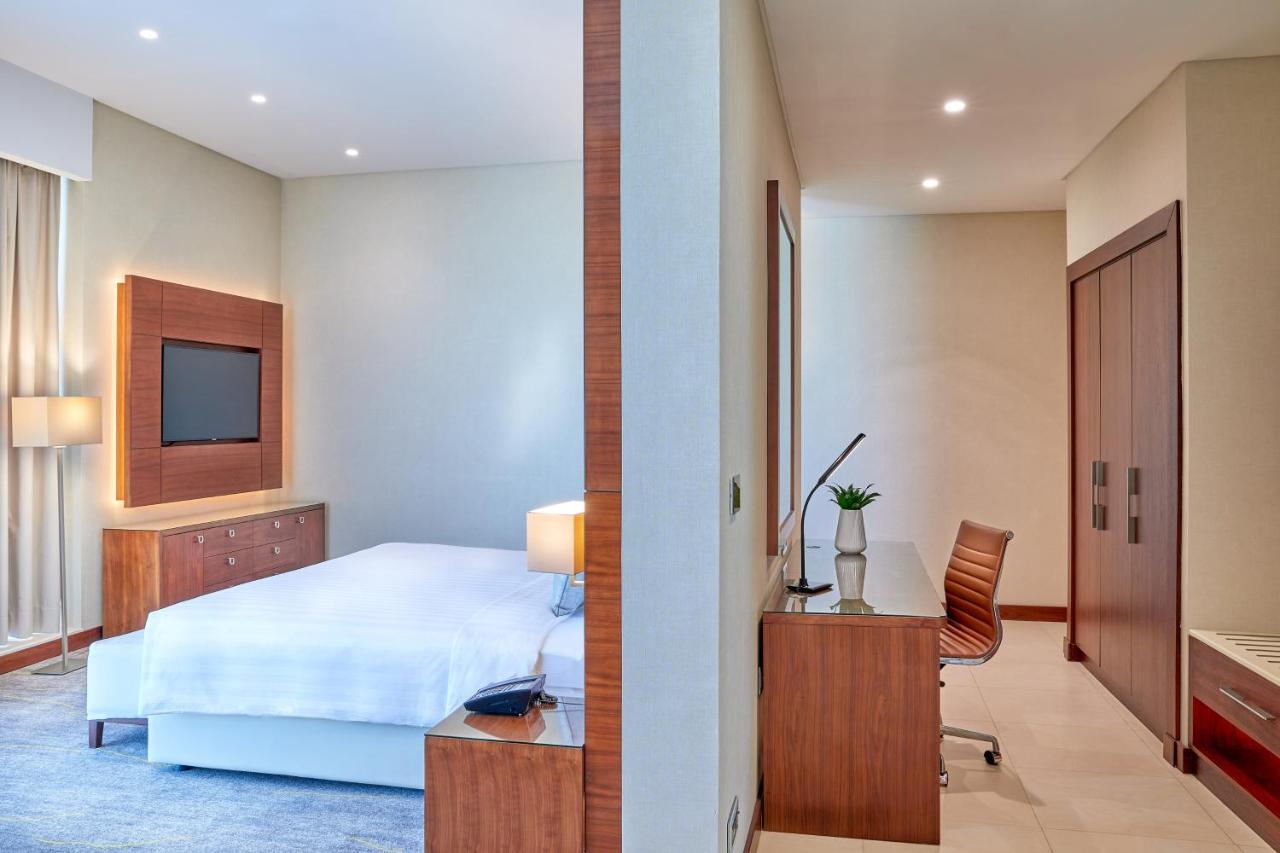 Hotel Dusitd2 Salwa Doha Exterior foto A bedroom at the hotel
