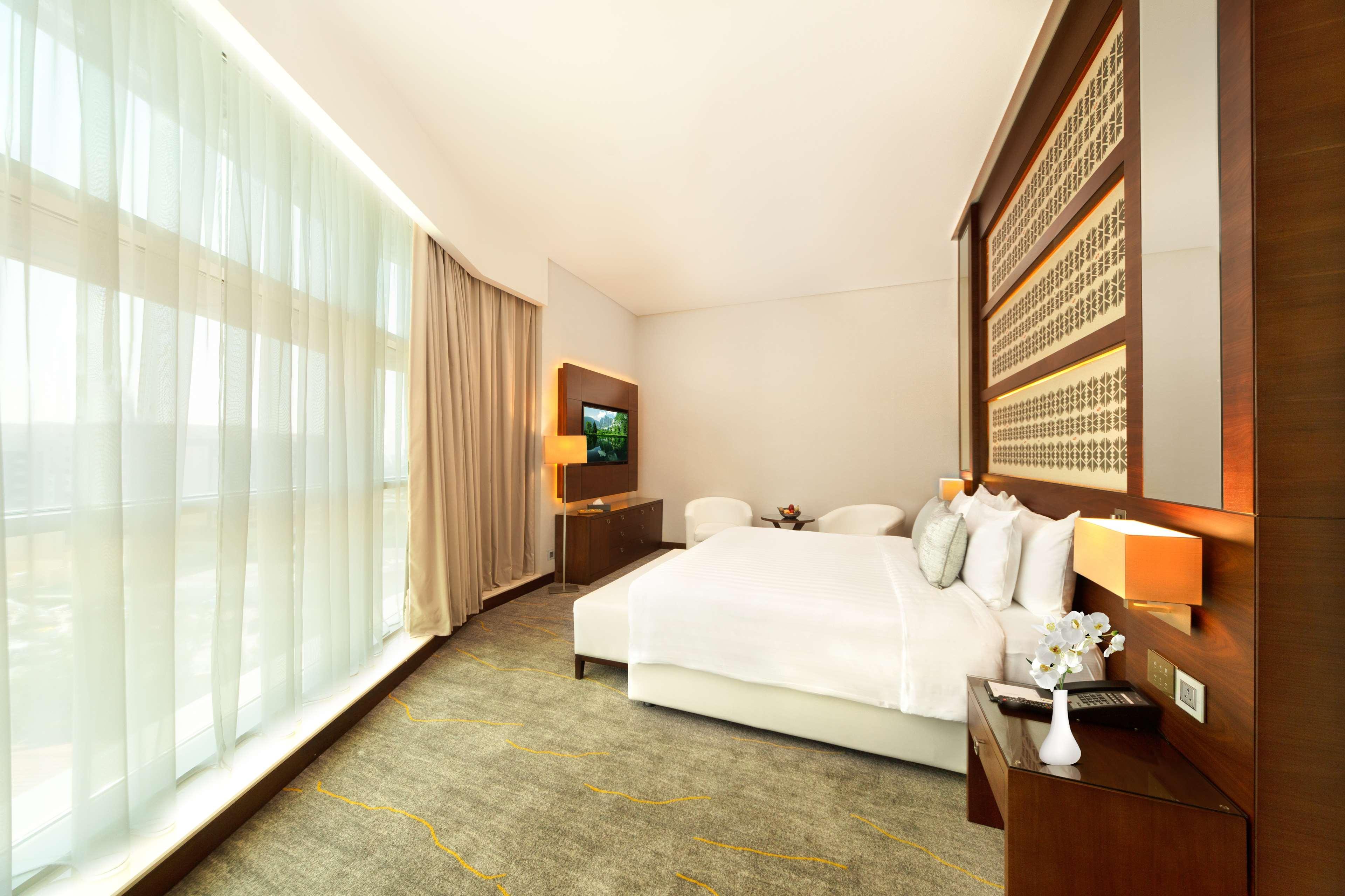 Hotel Dusitd2 Salwa Doha Exterior foto A bedroom at the hotel