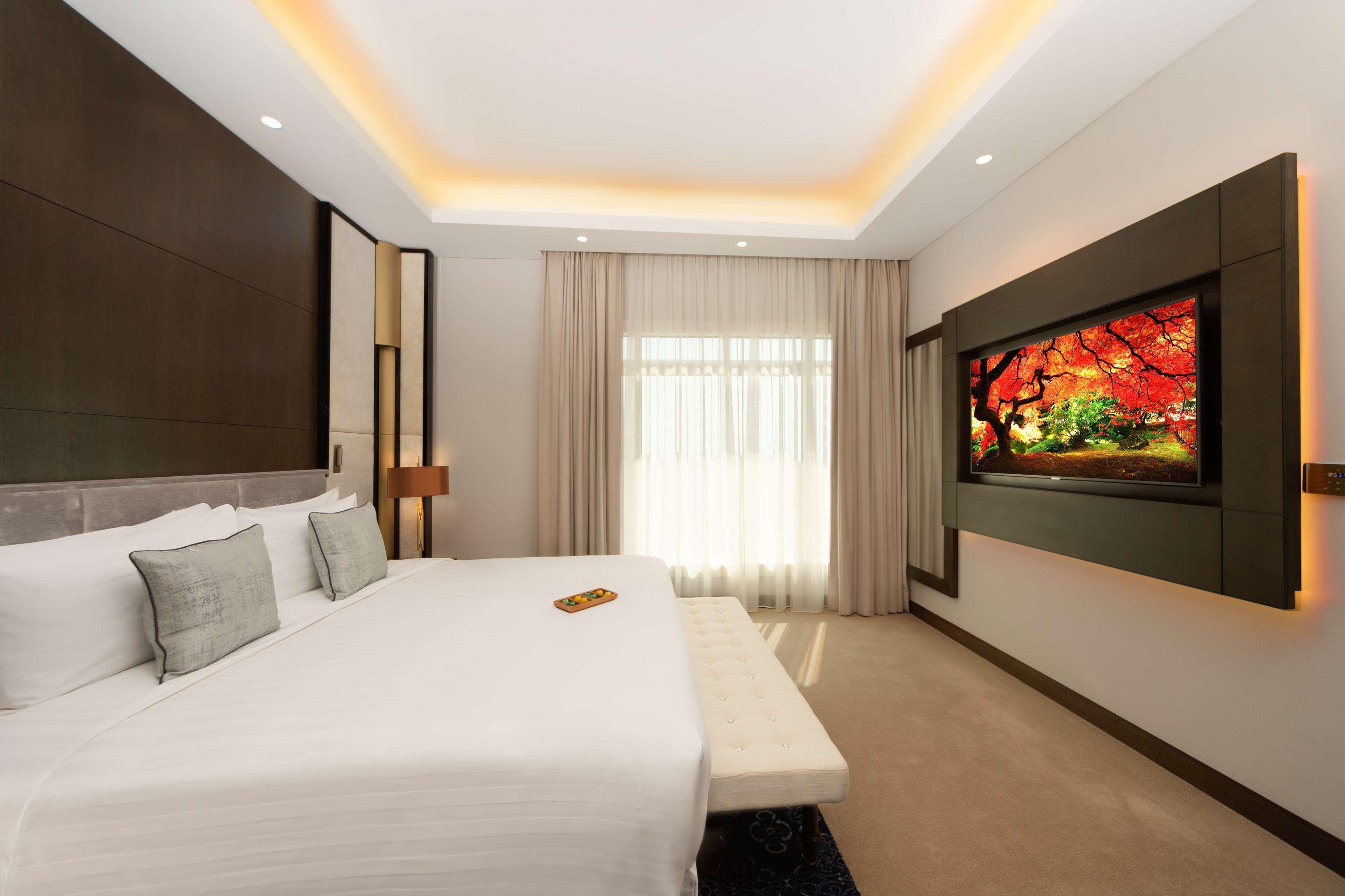 Hotel Dusitd2 Salwa Doha Exterior foto A bedroom at the hotel