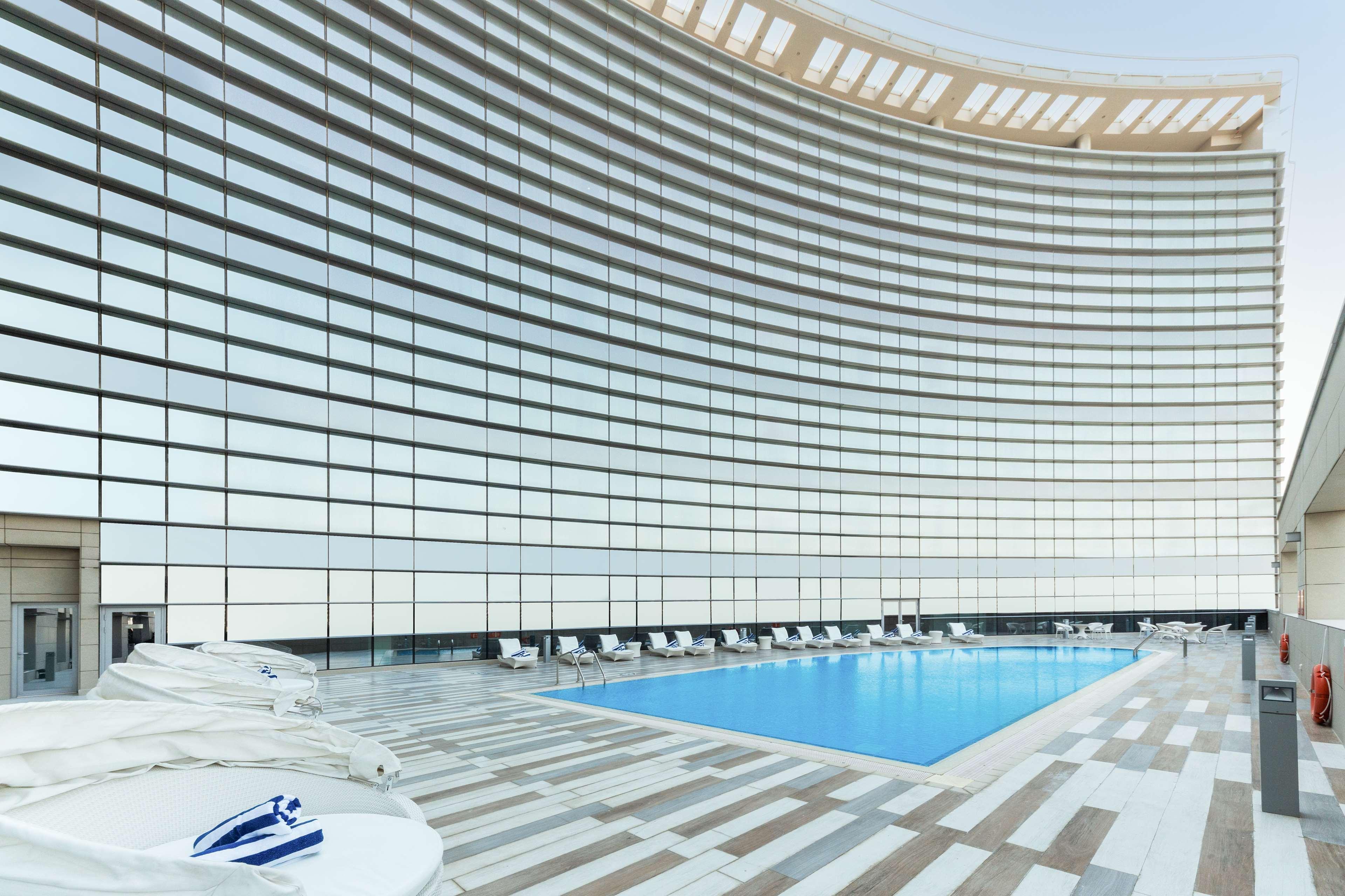 Hotel Dusitd2 Salwa Doha Exterior foto The pool at the 101